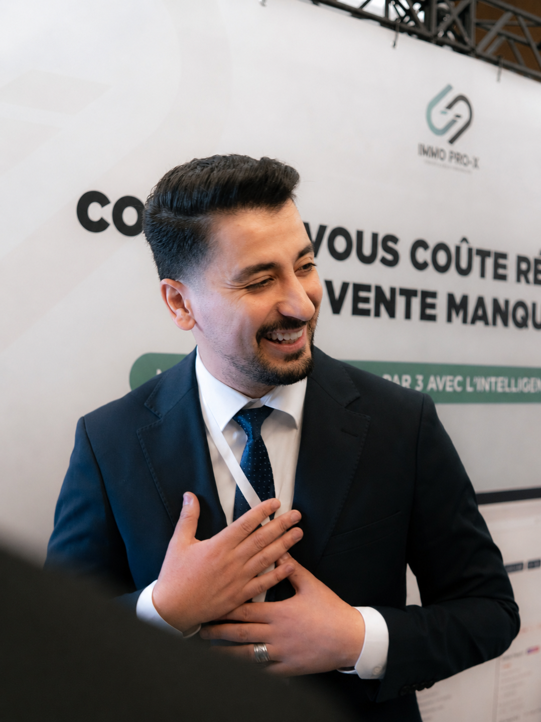 High-resolution photograph of Ahmat Kard at a professional event